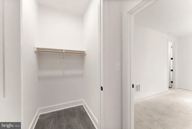 a view of a large building from a balcony