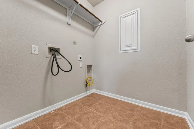 a view of a room with rack on the wall