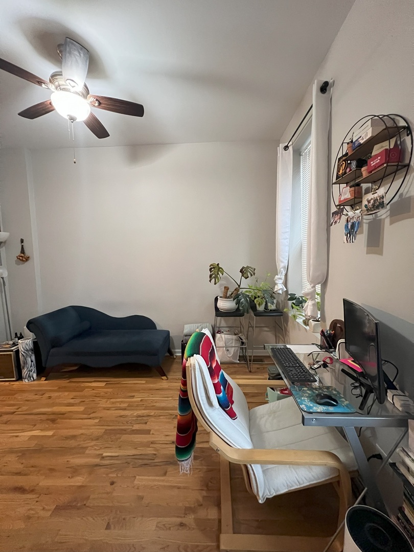 1532 West 18th Place, Unit 1F Chicago, IL 60608 - Photo 9 of 14 a bedroom with a bed and cabinets