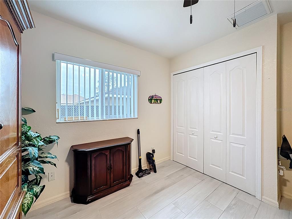 2500 Allegheny Lane North Port, FL 34286 - Photo 22 of 46 a living room with furniture and a fireplace