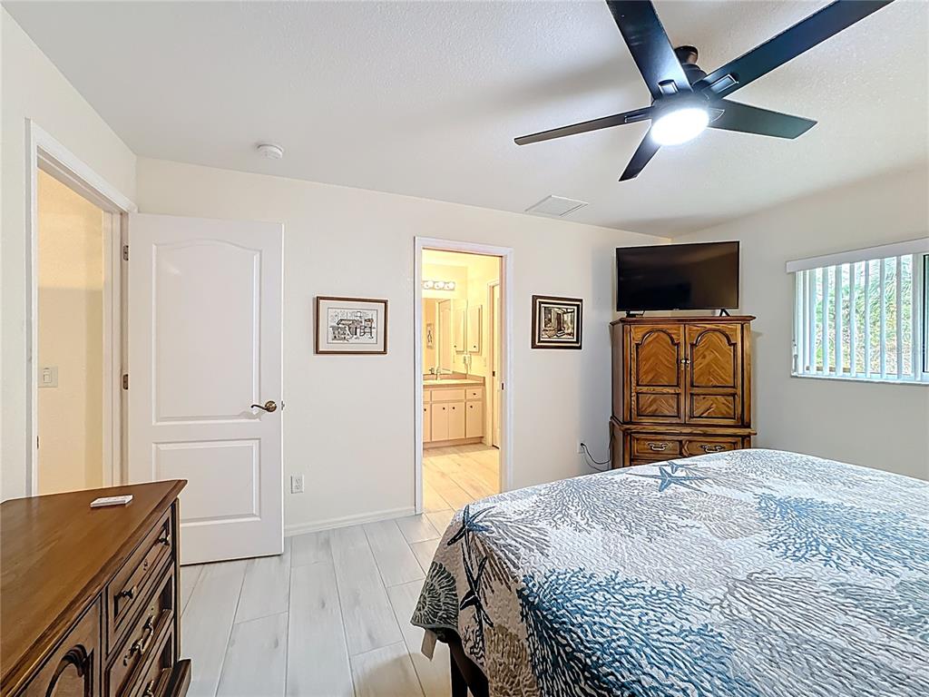 2500 Allegheny Lane North Port, FL 34286 - Photo 26 of 46 a bedroom with a bed and a television
