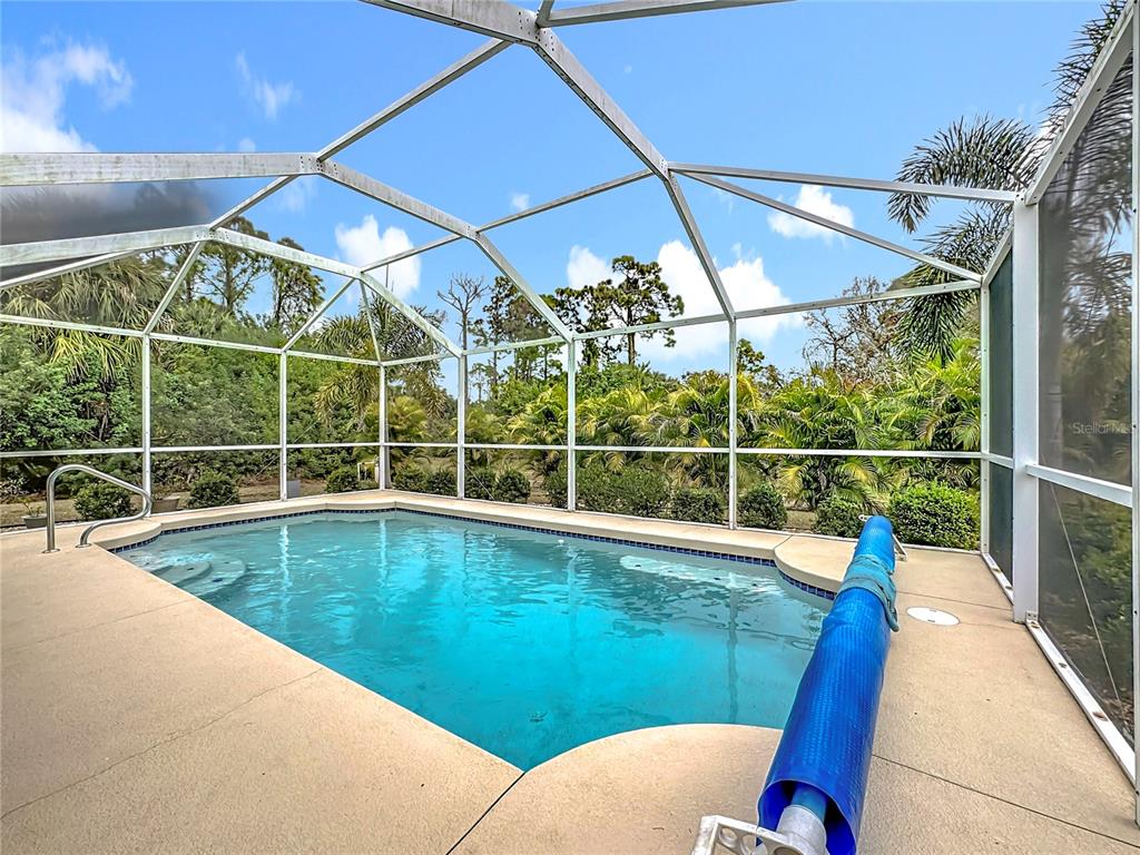 2500 Allegheny Lane North Port, FL 34286 - Photo 38 of 46 a view of a swimming pool with a lounge chairs