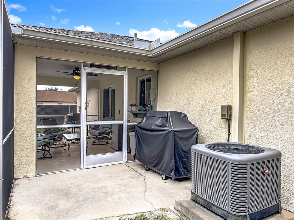 2500 Allegheny Lane North Port, FL 34286 - Photo 39 of 46 a living room with furniture and a flat screen tv