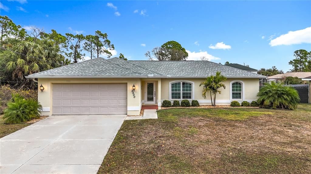 2500 Allegheny Lane North Port, FL 34286 - Photo 45 of 46 a front view of a house with a garden
