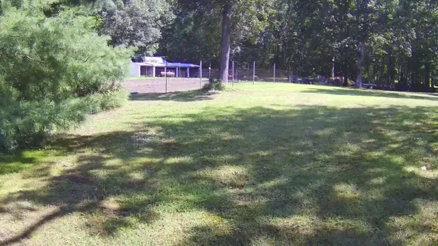 a view of a house with swimming pool