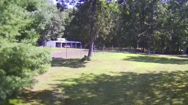 a view of a house with swimming pool