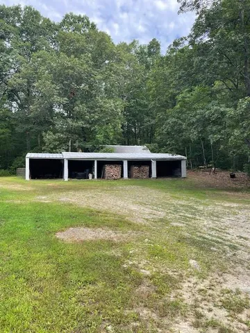 a house view with a outdoor space