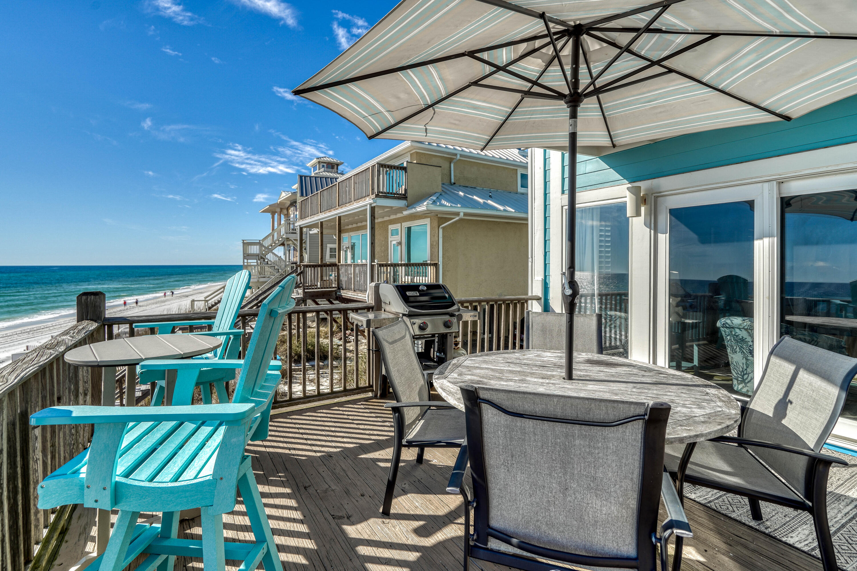 681 Eastern Lake Road, Unit 4 Santa Rosa Beach, FL 32459 - Photo 3 of 61 a view of a chairs and table in the patio