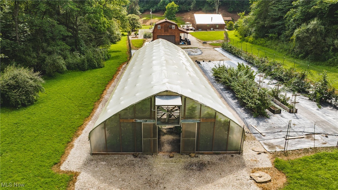 8089 Elk Fork Road Middlebourne, WV 26149 - Photo 34 of 50 Aerial View High Top Greenhouse & 150 ft of Raspberries
