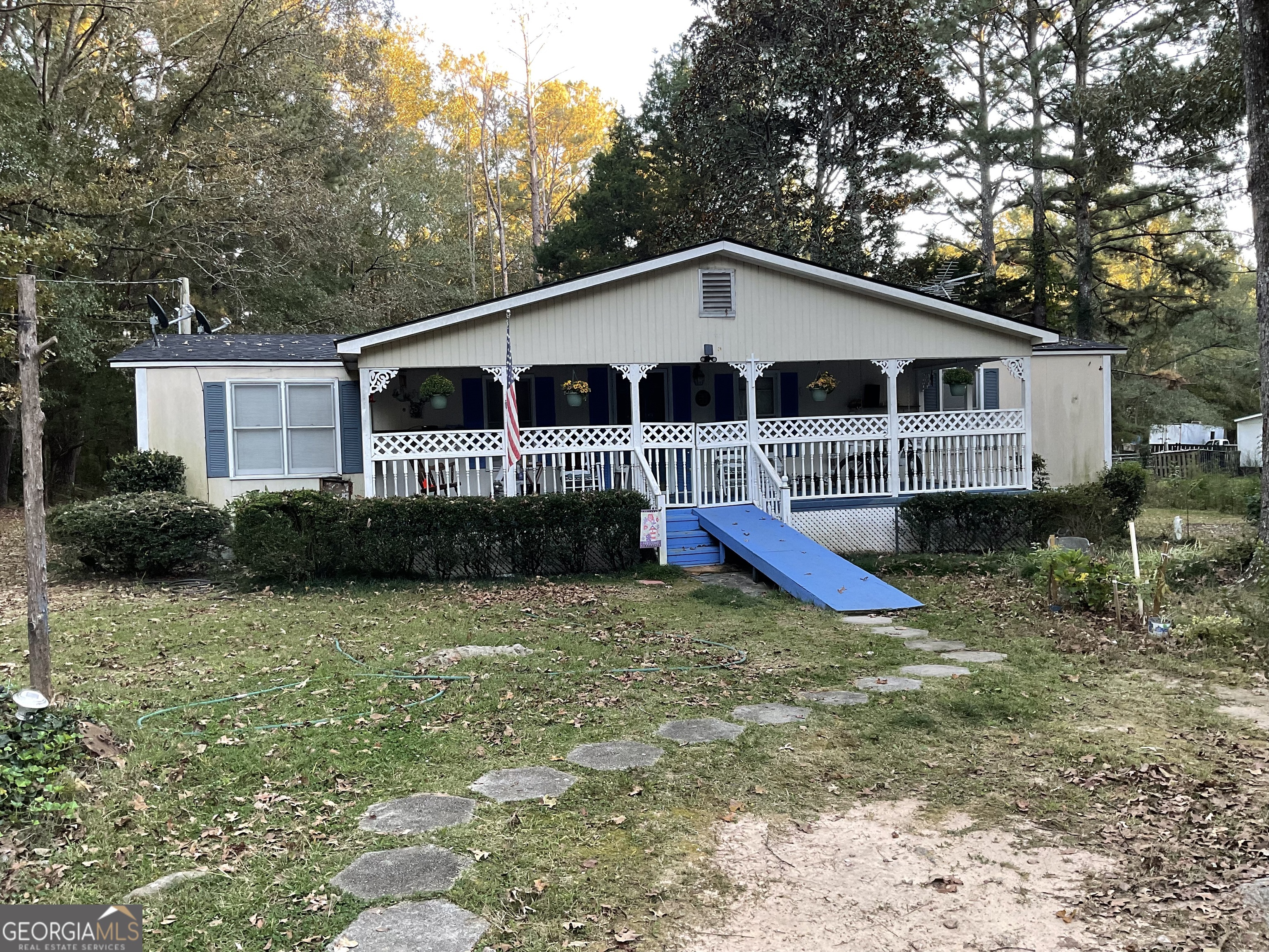 451 Weldon Lake Road Milner, GA 30257 - Photo 1 of 13 a view of a house with a yard