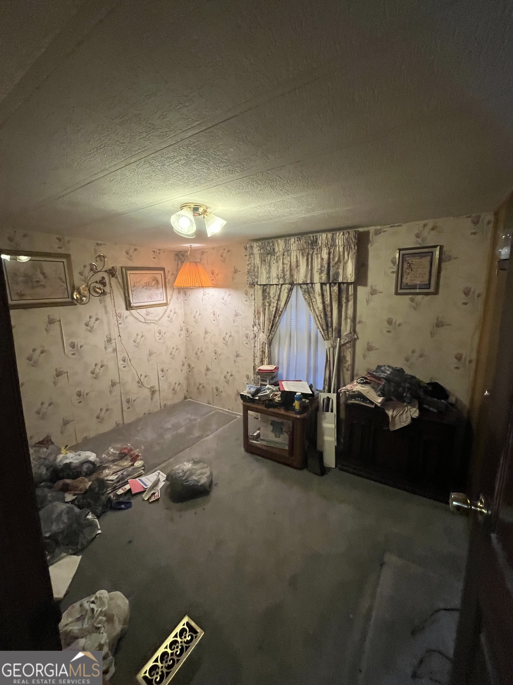 451 Weldon Lake Road Milner, GA 30257 - Photo 13 of 13 a view of a room with gym equipment