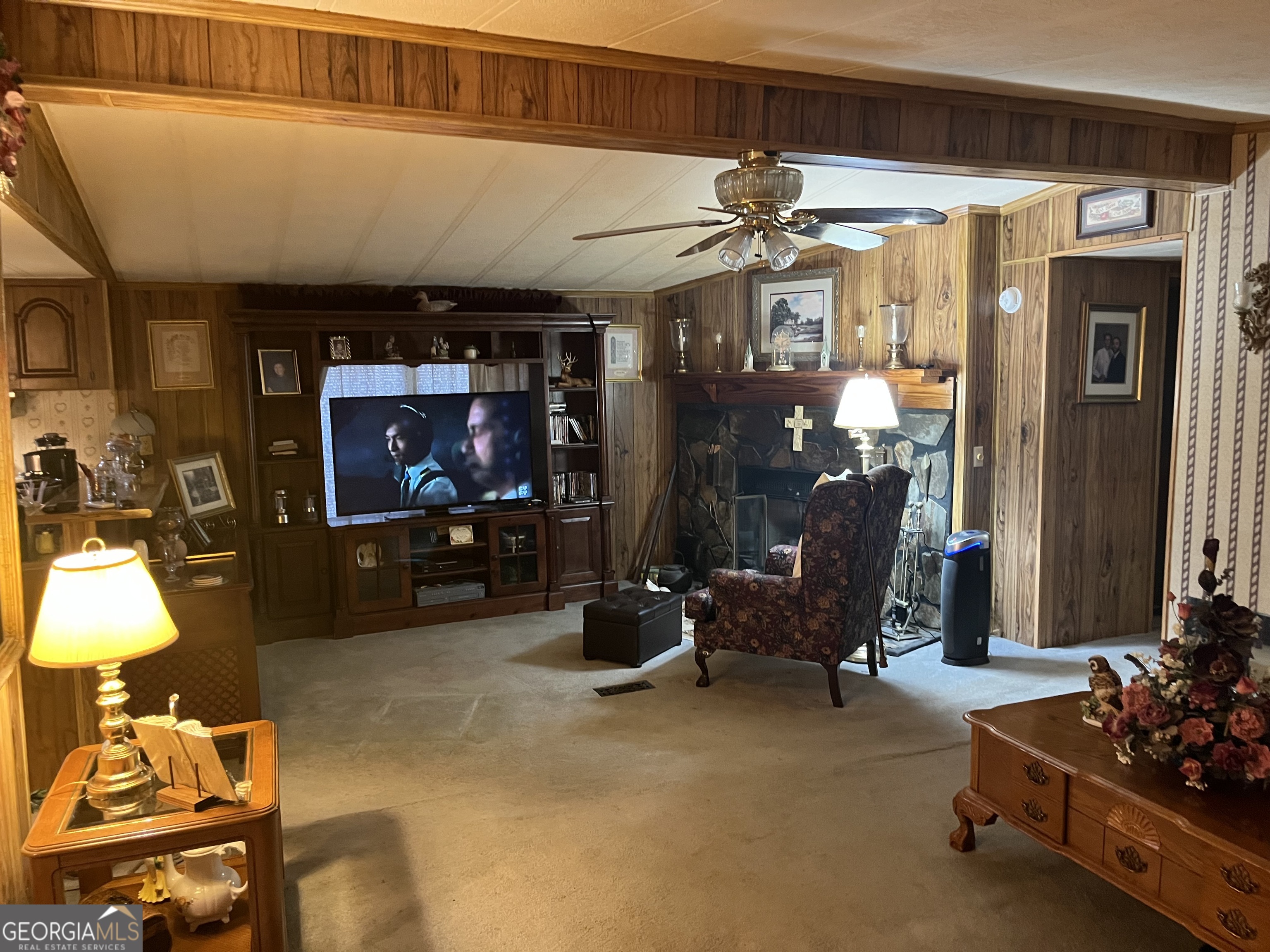 451 Weldon Lake Road Milner, GA 30257 - Photo 4 of 13 a room with lots of gym equipment