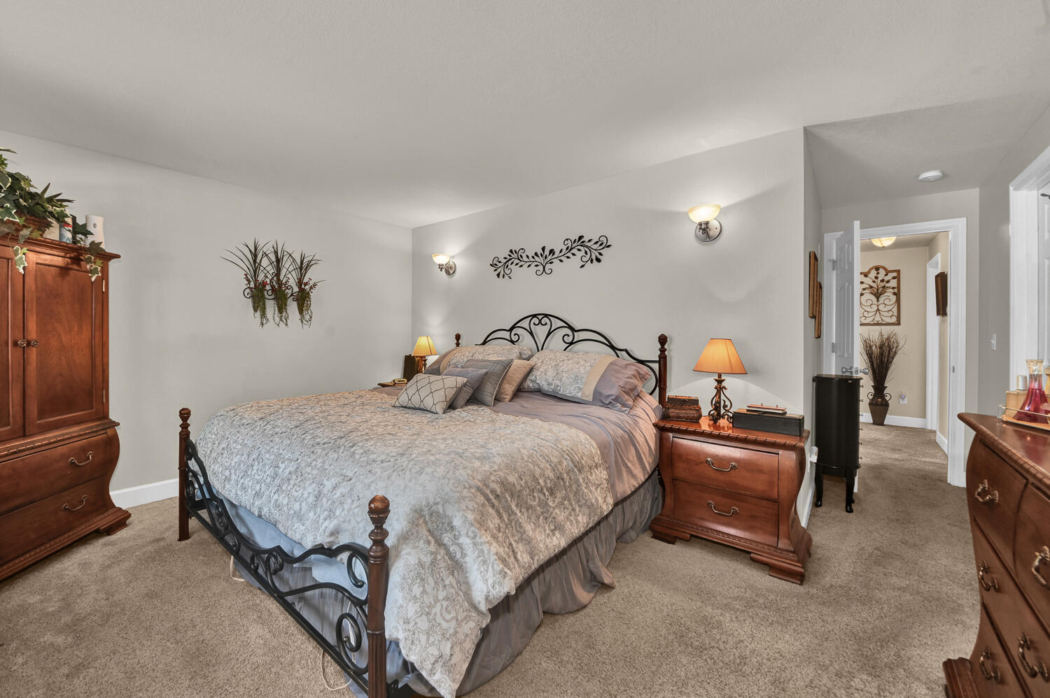 14840 Laurel Road La Pine, OR 97739 - Photo 15 of 32 a bedroom with a bed and wooden floor