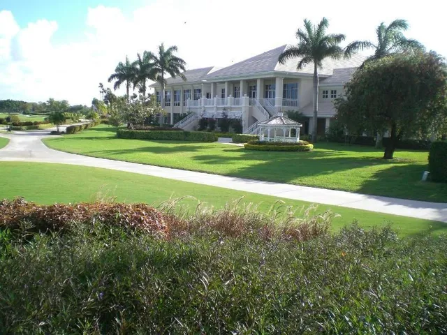 a view of a house with a big yard