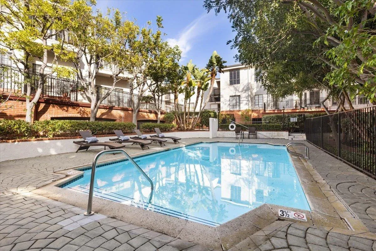 2630 Pirineos Way, Unit 5 Carlsbad, CA 92009 - Photo 23 of 48 a view of a yard in front of the house