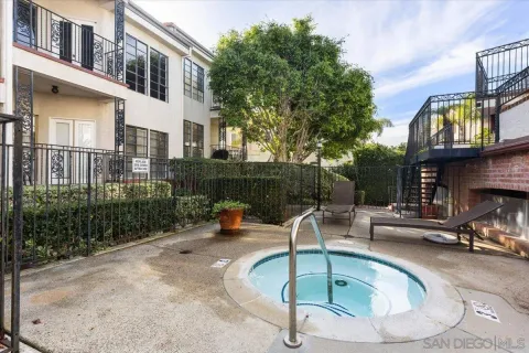 a view of a swimming pool with a patio