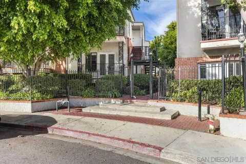 a view of a building with a street