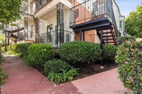 a view of a pathway with a house