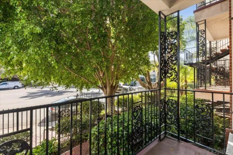 a view of swimming pool from a balcony