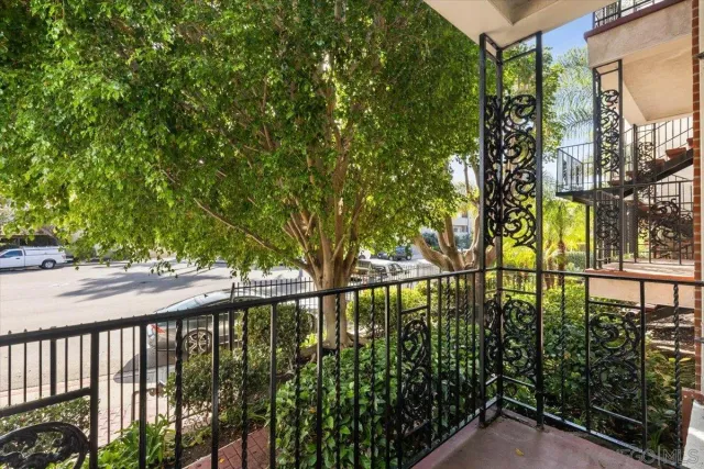 a view of swimming pool from a balcony
