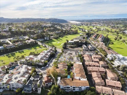 an aerial view of residential building and lake view