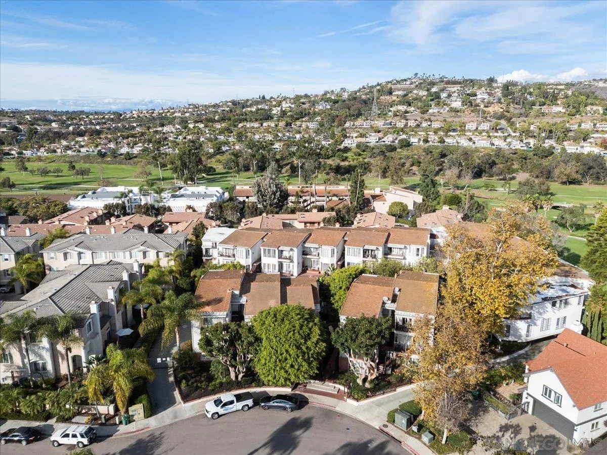 2630 Pirineos Way, Unit 5 Carlsbad, CA 92009 - Photo 42 of 48 an aerial view of residential houses with city view