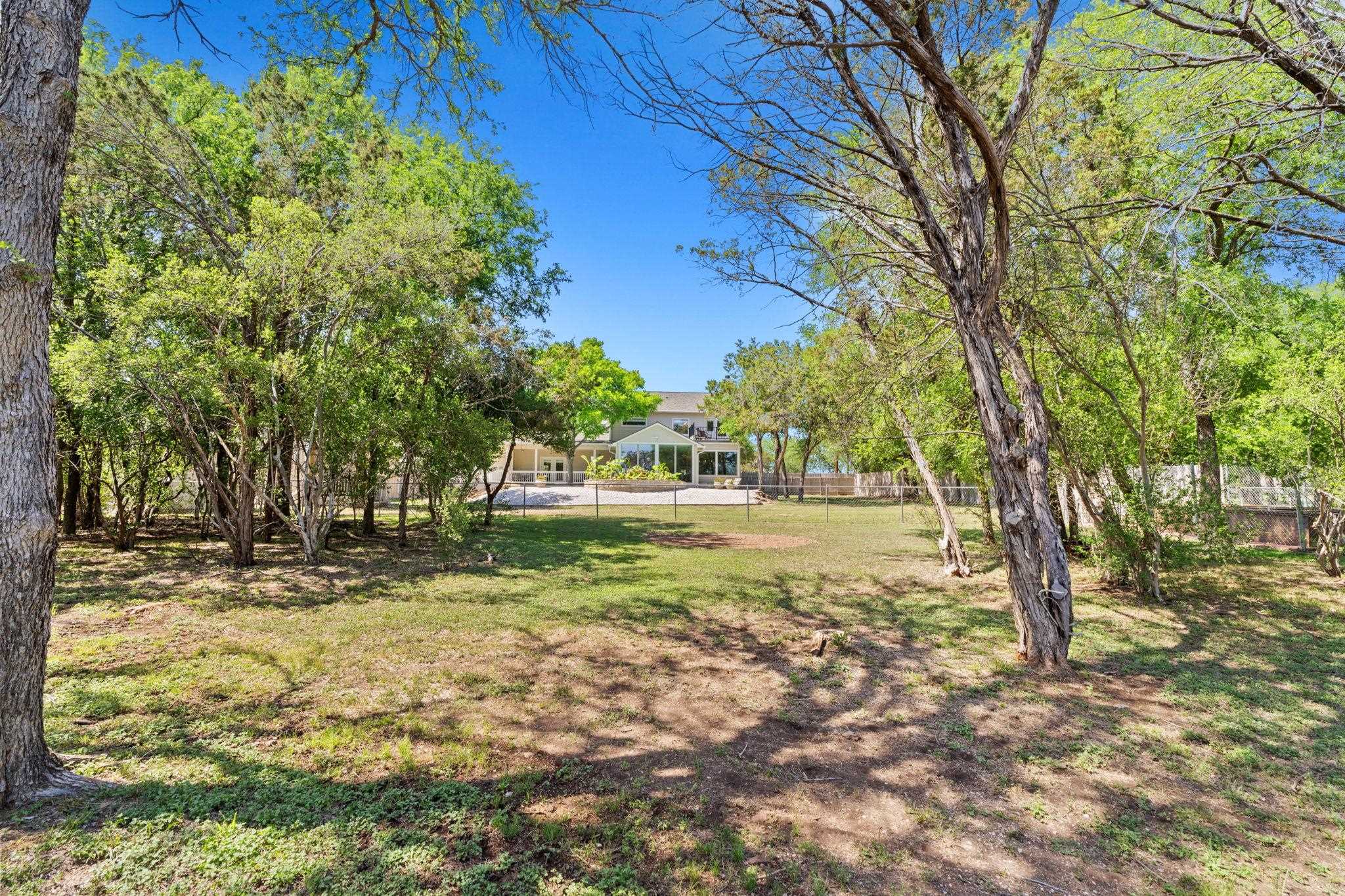 2409 Mormon Mill Road Marble Falls, TX 78654 - Photo 24 of 30 a view of yard with tree