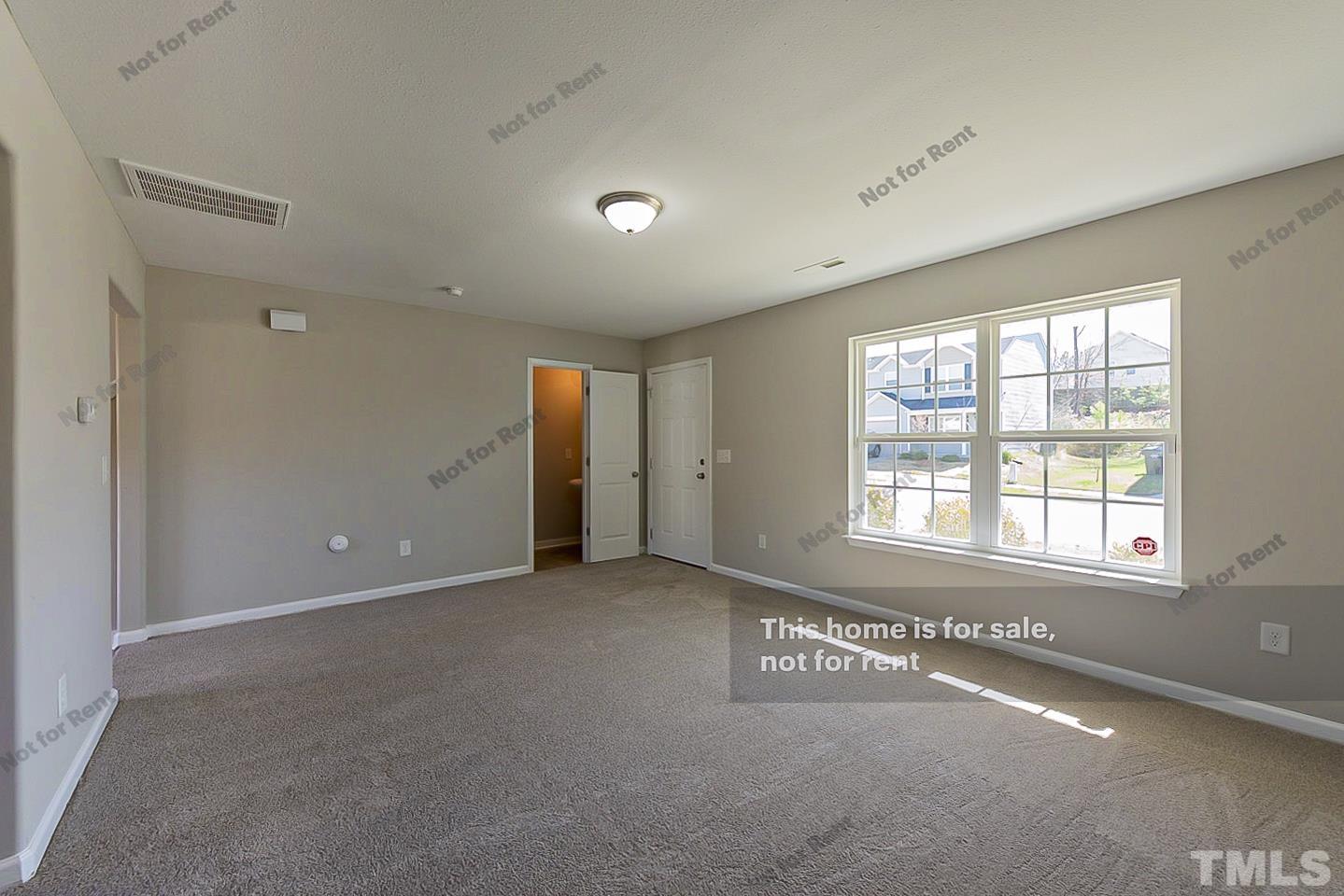 1908 Buffalo Way Durham, NC 27704 - Photo 15 of 26 an empty room with windows