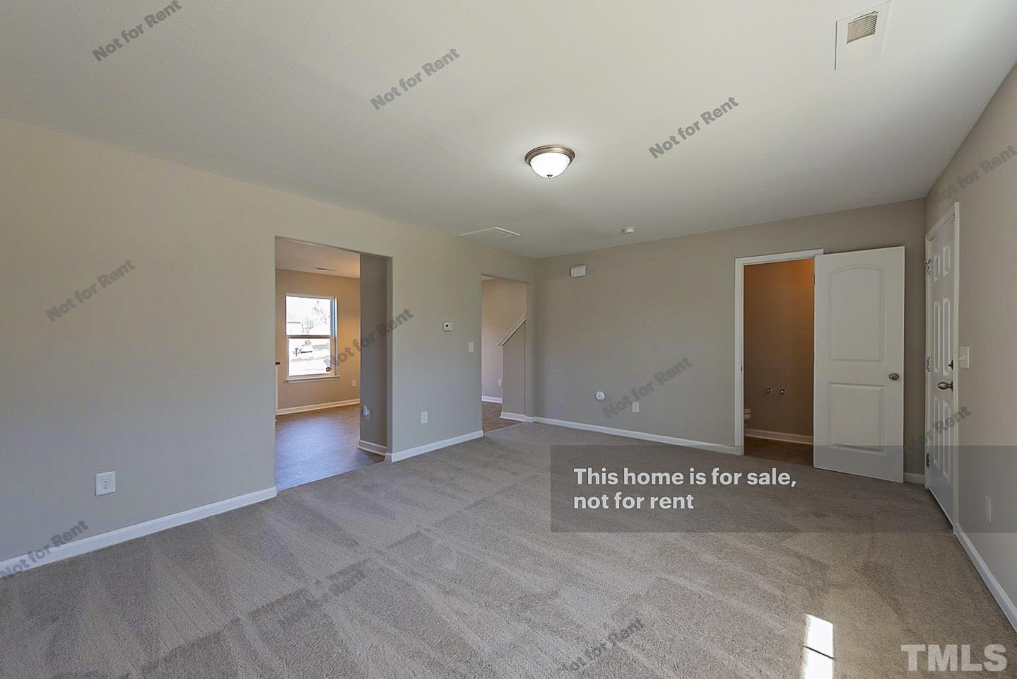 1908 Buffalo Way Durham, NC 27704 - Photo 16 of 26 a view of an empty room and window