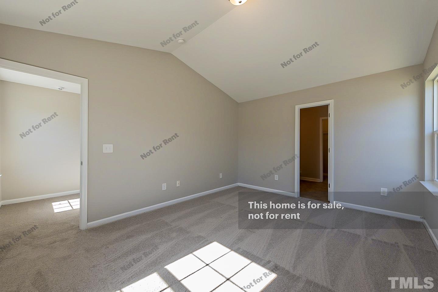 1908 Buffalo Way Durham, NC 27704 - Photo 17 of 26 a view of a hallway to a room with an empty space