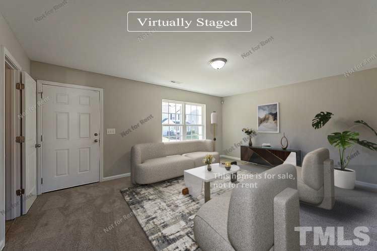 1908 Buffalo Way Durham, NC 27704 - Photo 2 of 26 a living room with furniture and a potted plant