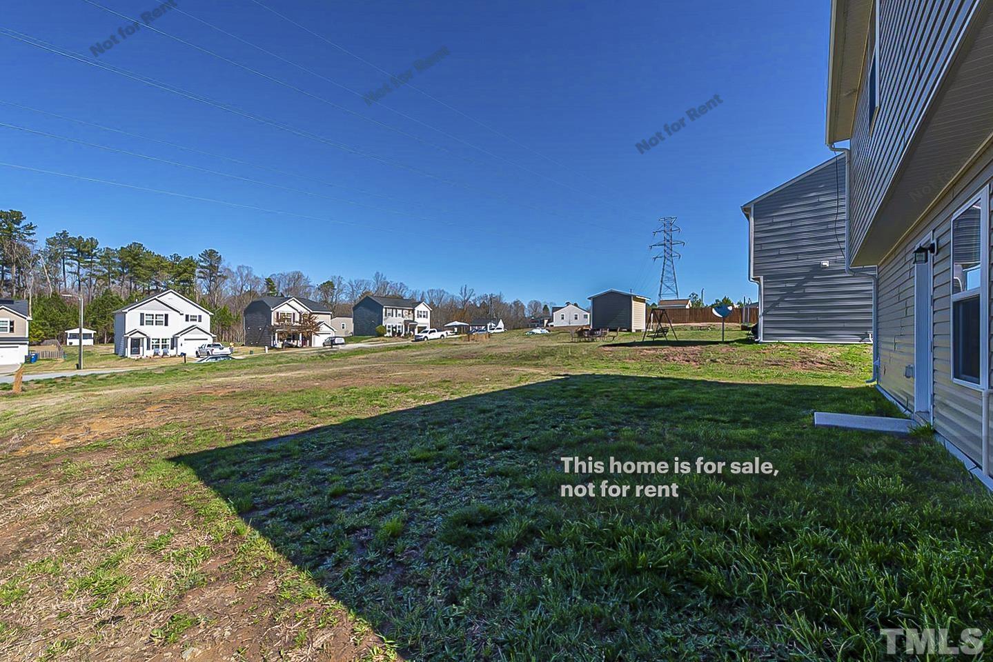 1908 Buffalo Way Durham, NC 27704 - Photo 25 of 26 a view of yard with swimming pool and green space