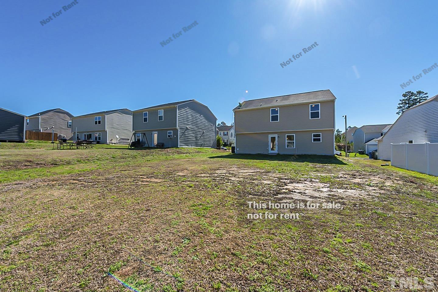 1908 Buffalo Way Durham, NC 27704 - Photo 26 of 26 a view of a large house with a big yard