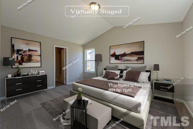 1908 Buffalo Way Durham, NC 27704 - Photo 4 of 26 a living room with furniture and a flat screen tv