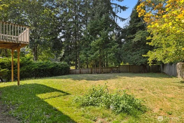 a view of swimming pool with a yard