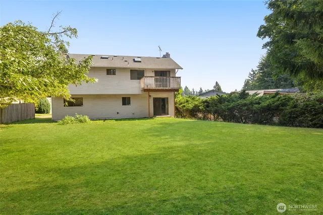 a view of a large building with a big yard