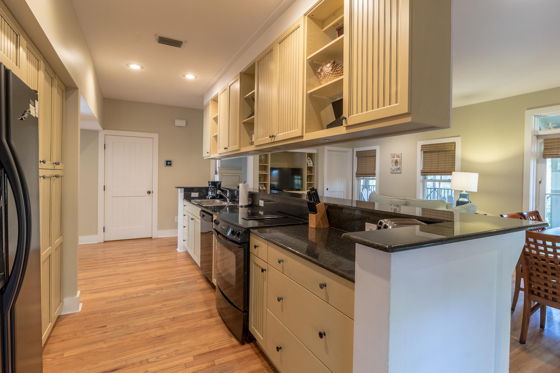 19 Vizcaya Lane Inlet Beach, FL 32461 - Photo 2 of 26 a kitchen with stainless steel appliances granite countertop a sink and cabinets