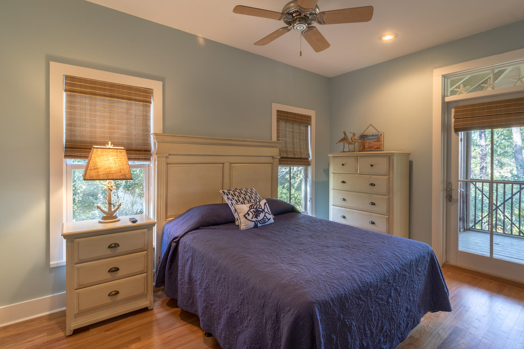 19 Vizcaya Lane Inlet Beach, FL 32461 - Photo 12 of 26 a bedroom with a large bed and a window