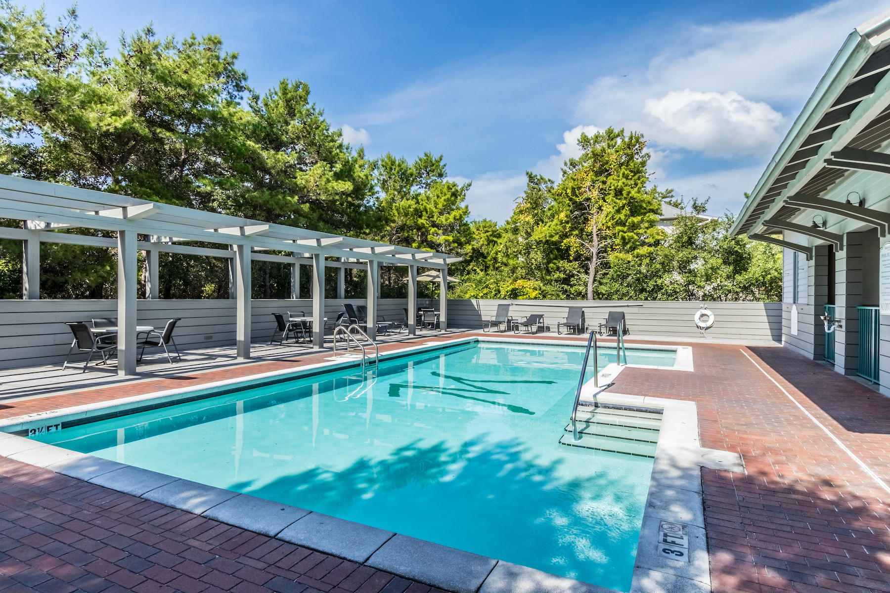 19 Vizcaya Lane Inlet Beach, FL 32461 - Photo 21 of 26 a view of a swimming pool with chairs