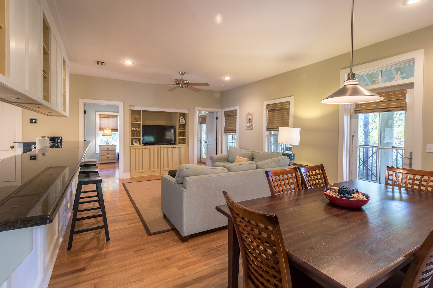 19 Vizcaya Lane Inlet Beach, FL 32461 - Photo 5 of 26 a view of a dining room with furniture window and wooden floor
