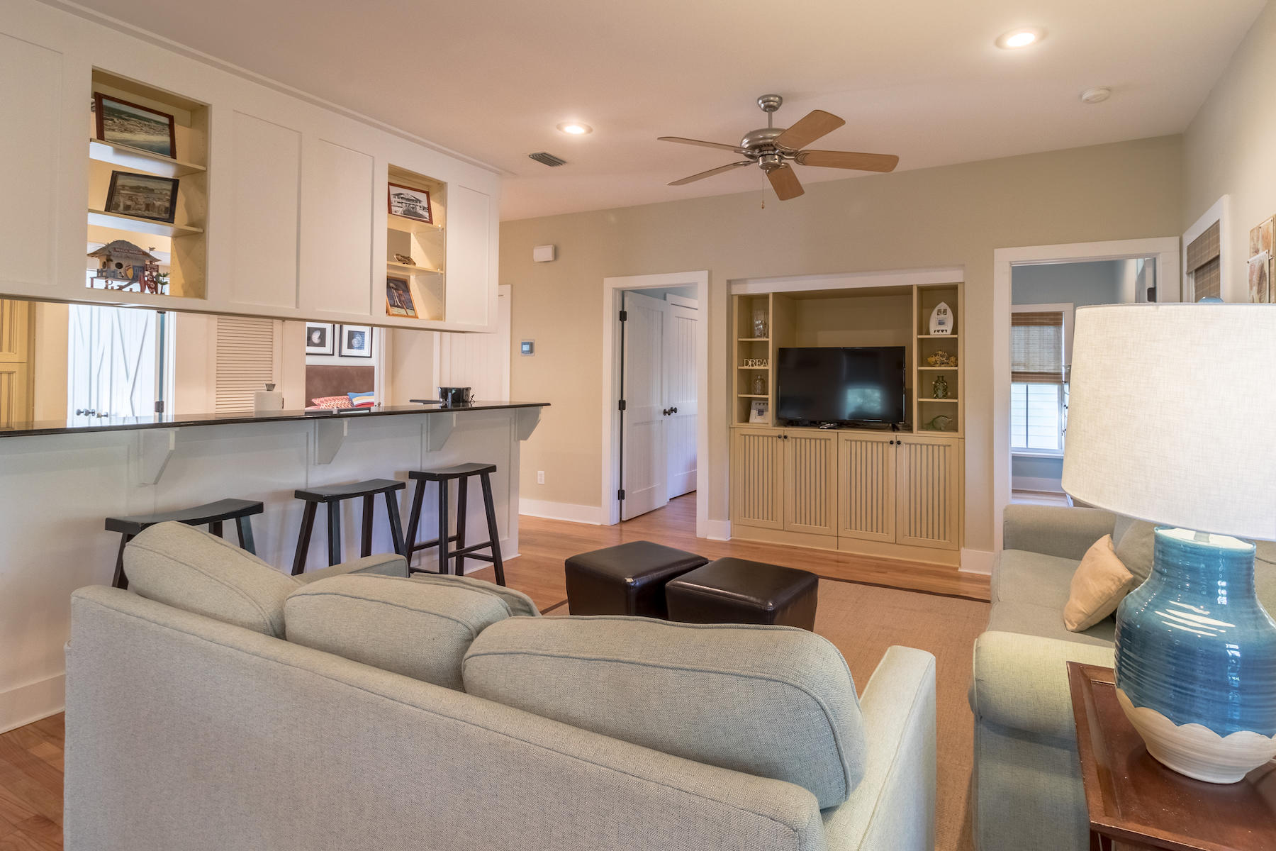 19 Vizcaya Lane Inlet Beach, FL 32461 - Photo 6 of 26 a living room with furniture and a flat screen tv