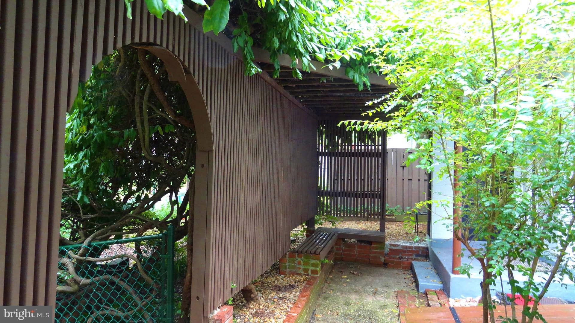 23 Ridge Road, Unit E Greenbelt, MD 20770 - Photo 2 of 5 Front Arbor