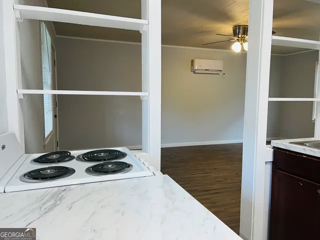 a bathroom with a sink and a window
