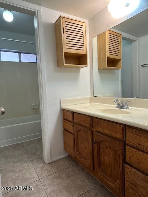 1843 N Spring, Unit 201 Mesa, AZ 85203 - Photo 19 of 24 a bathroom with a sink double vanity and bathtub