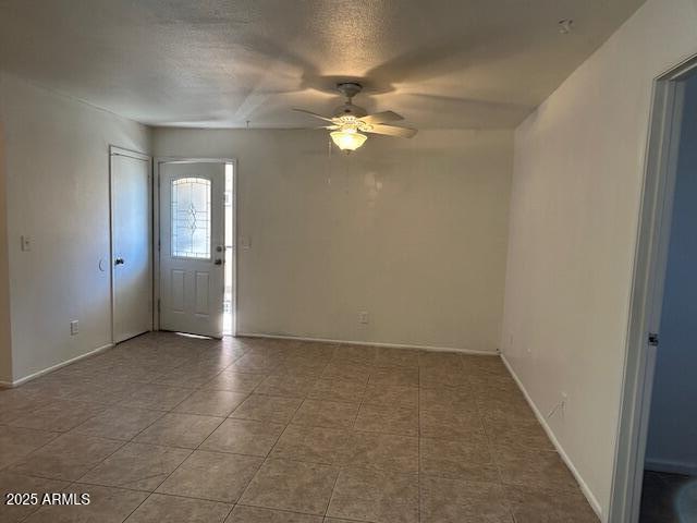 1843 N Spring, Unit 201 Mesa, AZ 85203 - Photo 7 of 24 an empty room with windows and fan