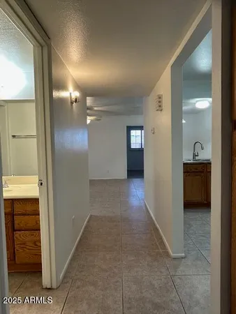 a view of a hallway with some storage area