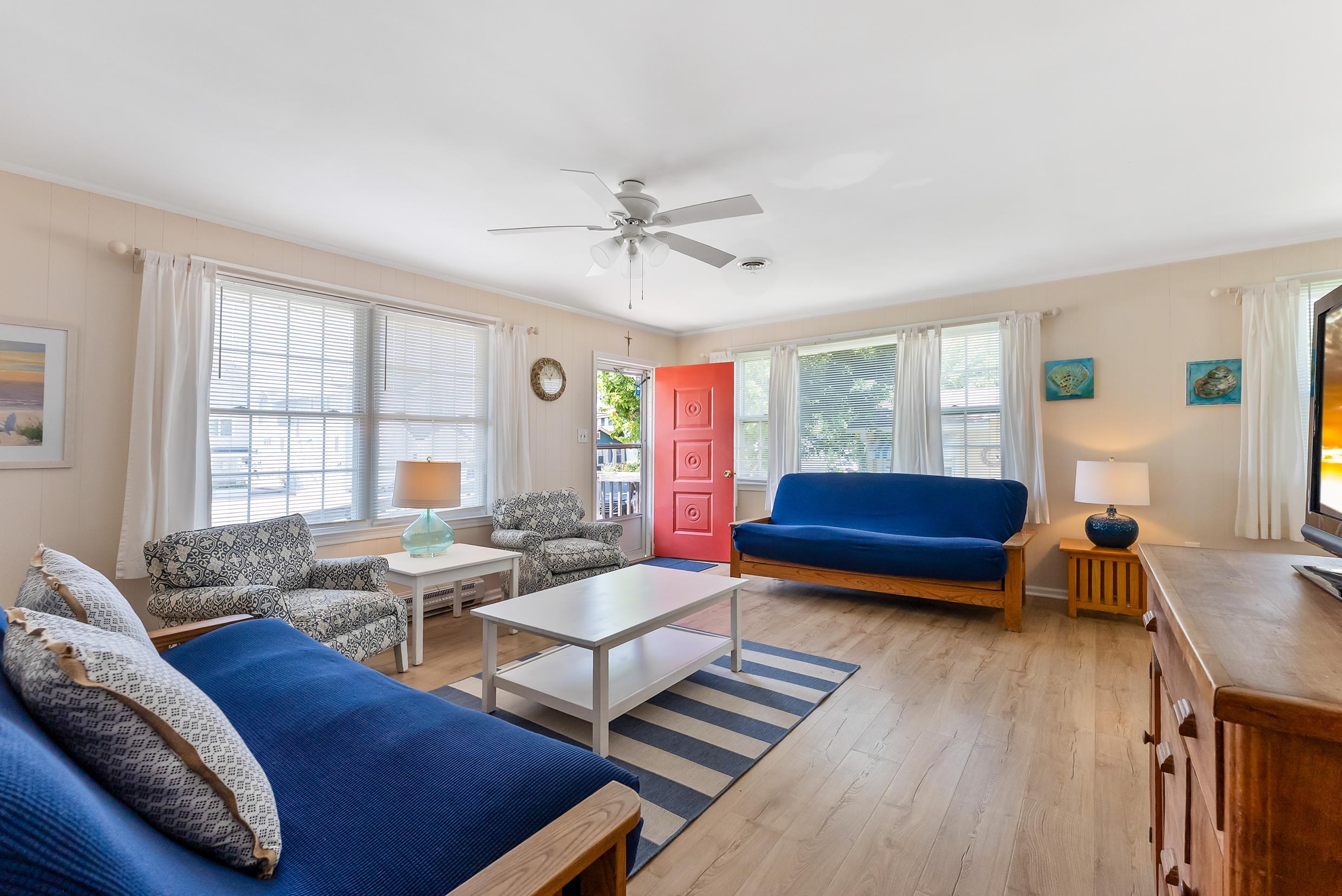 647 Barry Road Avalon, NJ 08202 - Photo 3 of 25 a living room with furniture and a window