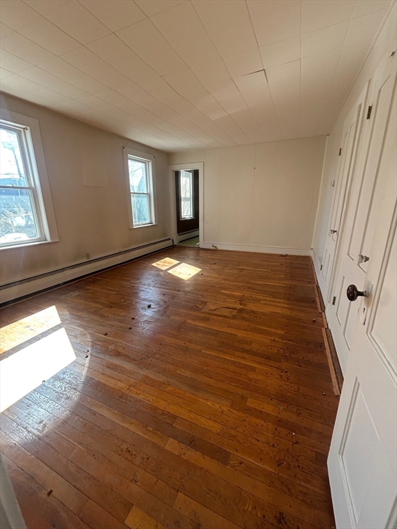 1 Dunlap Street Salem, MA 01970 - Photo 11 of 31 a view of empty room with window and wooden floor