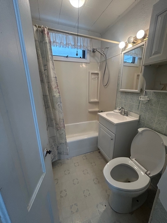 1 Dunlap Street Salem, MA 01970 - Photo 15 of 31 a bathroom with a toilet a sink and a shower
