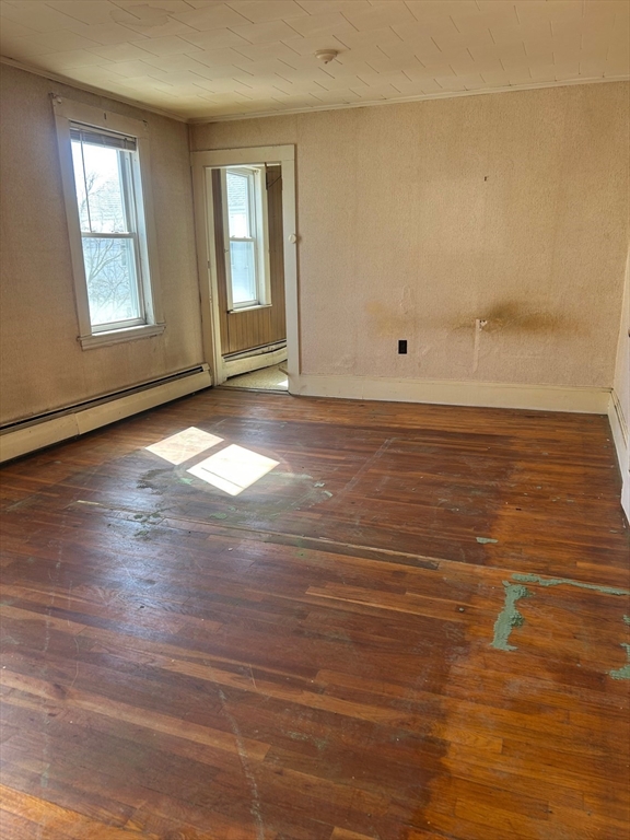 1 Dunlap Street Salem, MA 01970 - Photo 19 of 31 wooden floor in an empty room with a window